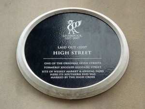 Black plaque marking the location of High Street, Liverpool, one of the original seven streets of the town